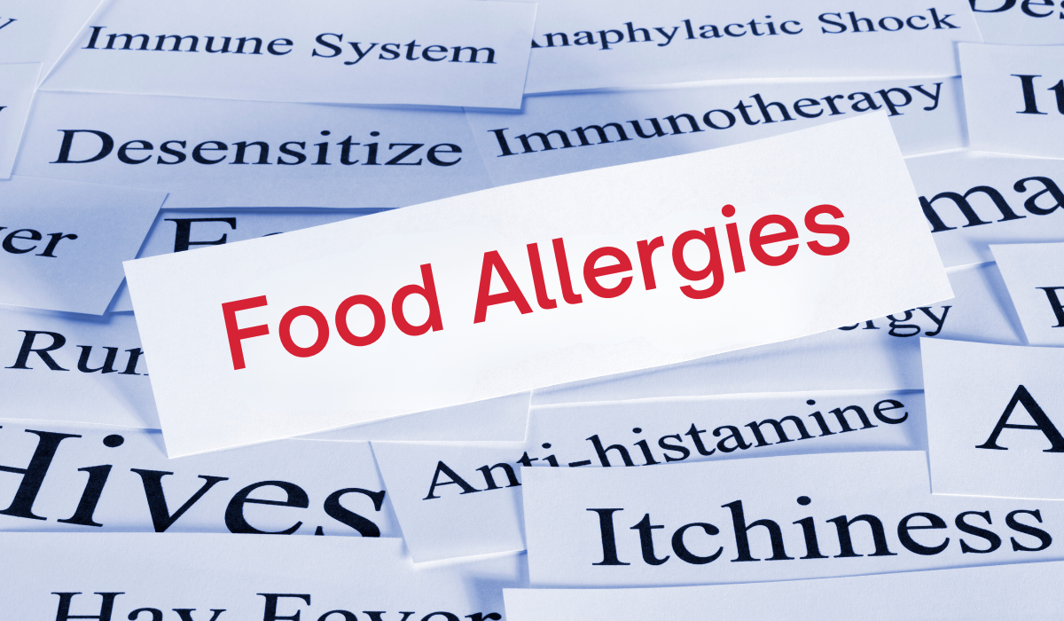 image with multiple words with FOOD ALLERGIES on top of other words like hives, itchiness, epi-pen
