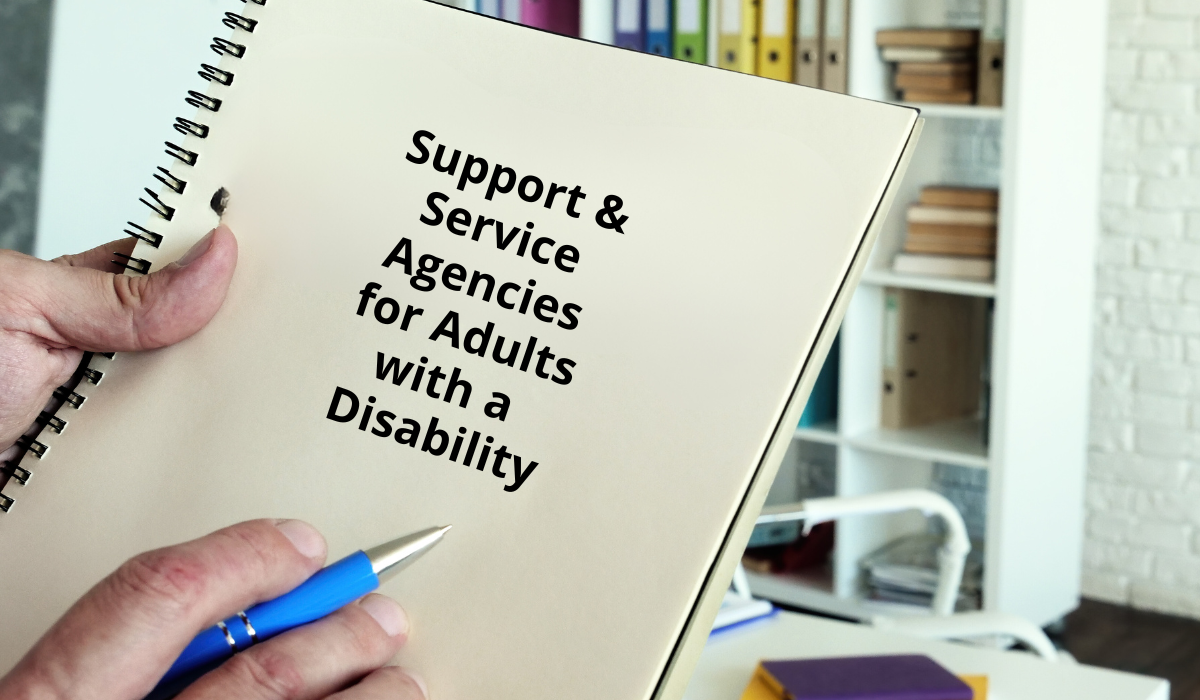 image of a folder with text that reads Support & Service Agencies for Adults with a Disability