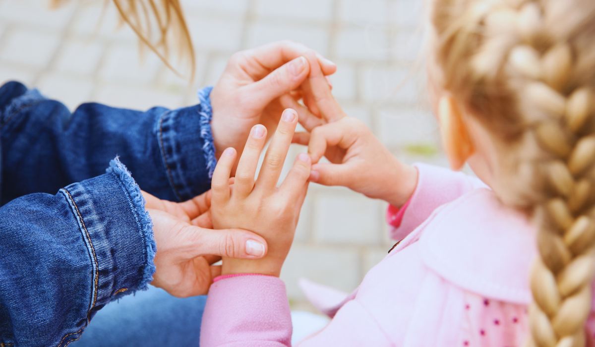 close up of hands, teaching and manipulating for American Sign Language