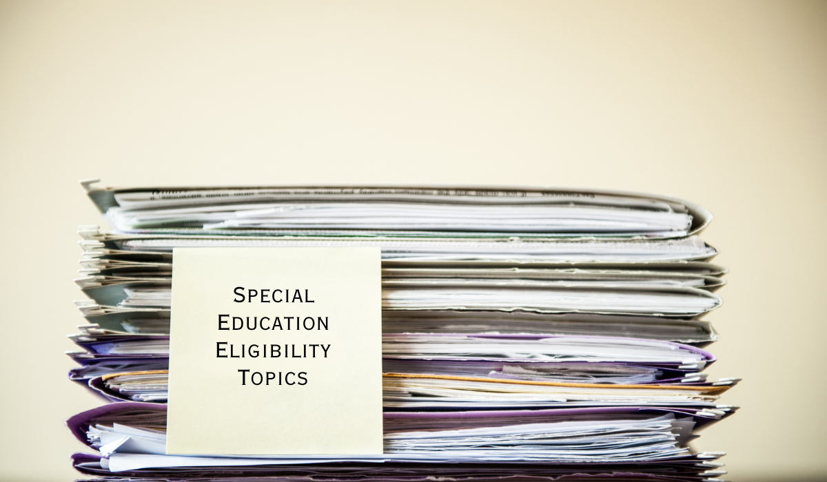 stack of folders text that reads special education eligibility topics